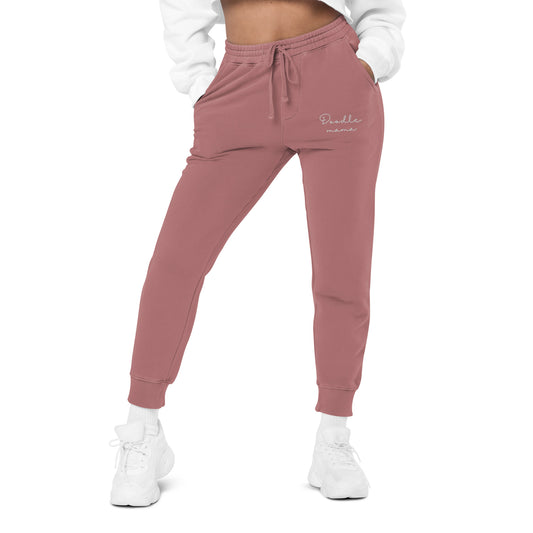 Woman wearing oversized washed out sweatpants front side color maroon