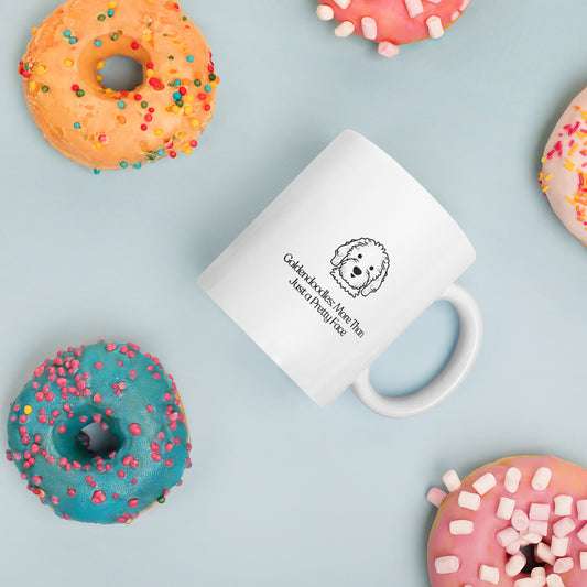 white color glossy ceramic mug that says goldendoodle more than just a pretty face around donuts